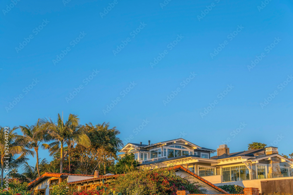 Upscale beach home against clear blue sky at scenic Del Mar Southern California Upscale beach home against clear blue sky at scenic Del Mar Southern California
