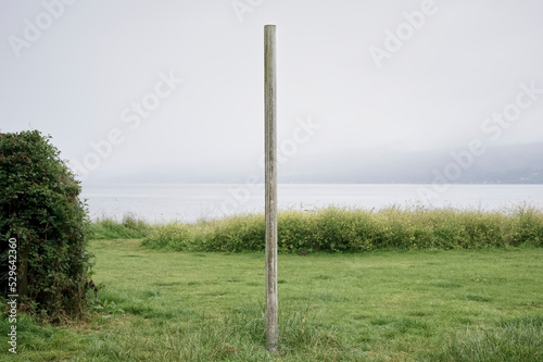 Old derelict wooden post at Lunderston Bay Inveclyde photo