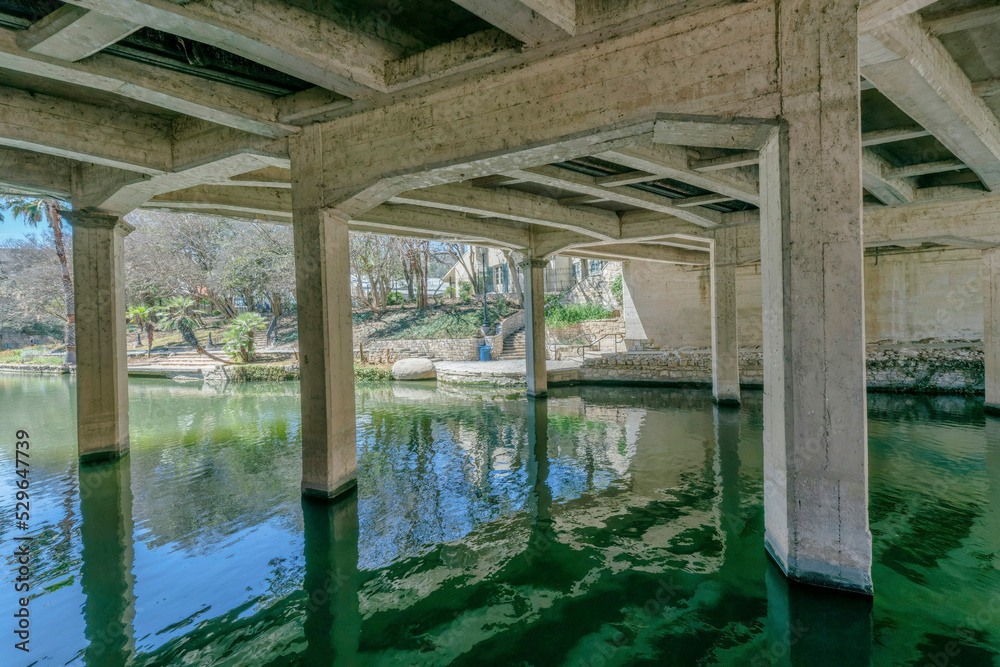 Fototapeta premium View of the canal underneath the bridge at River Walk in San Antonio Texas