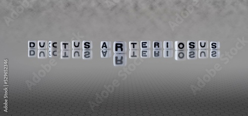 ductus arteriosus word or concept represented by black and white letter cubes on a grey horizon background stretching to infinity