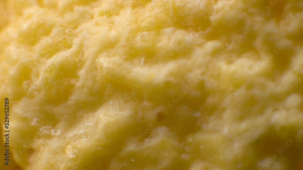 Dry corn flakes, close-up, macro. Corn flakes rotation, corn flakes background, high dynamic range. Healthy breakfast, healthy vegetarian food. Dry corn flakes, close-up, macro. Corn flakes rotation, corn flakes background, high dynamic range. Healthy breakfast, healthy vegetarian food.