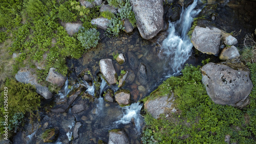 Top view on a river stream. Rocky river
