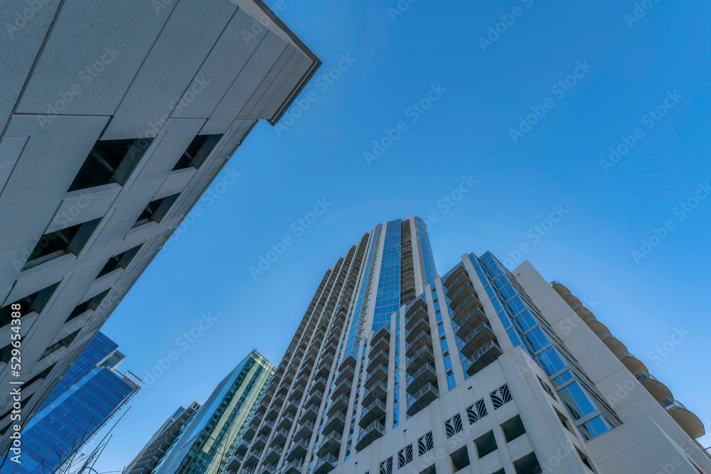 Austin Texas skyline with view of apartments and multi level parking garage Austin Texas skyline with view of apartments and multi level parking garage