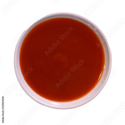 Sriracha, chili sauce on white plate. isolated on white background, top view.