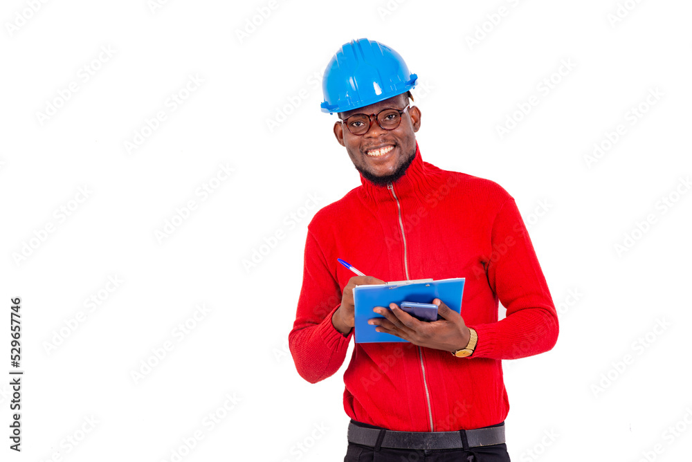 portrait of a young engineer with notepad, happy. portrait of a young engineer with notepad, happy.