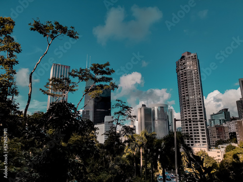 Beautiful evening view, Blue sky,clouds, buildings and trees background 