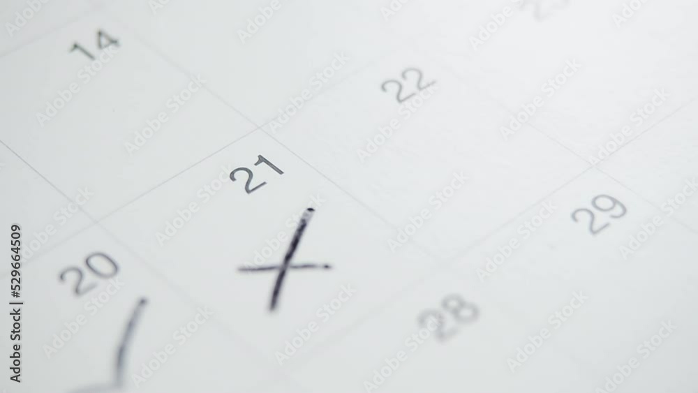 Noted cross on the calendar at twenty one number Noted cross on the calendar at twenty one number