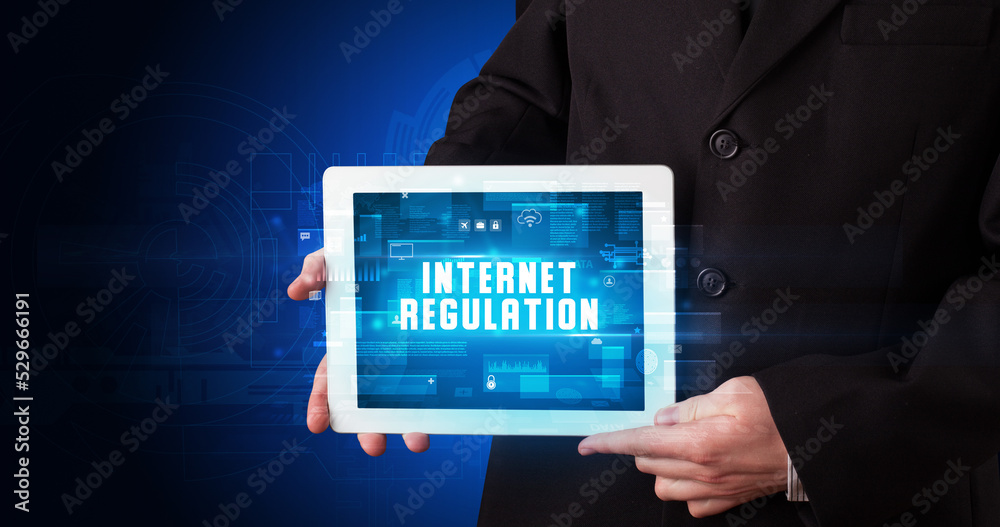 Person holding tablet, security concept Person holding tablet, security concept