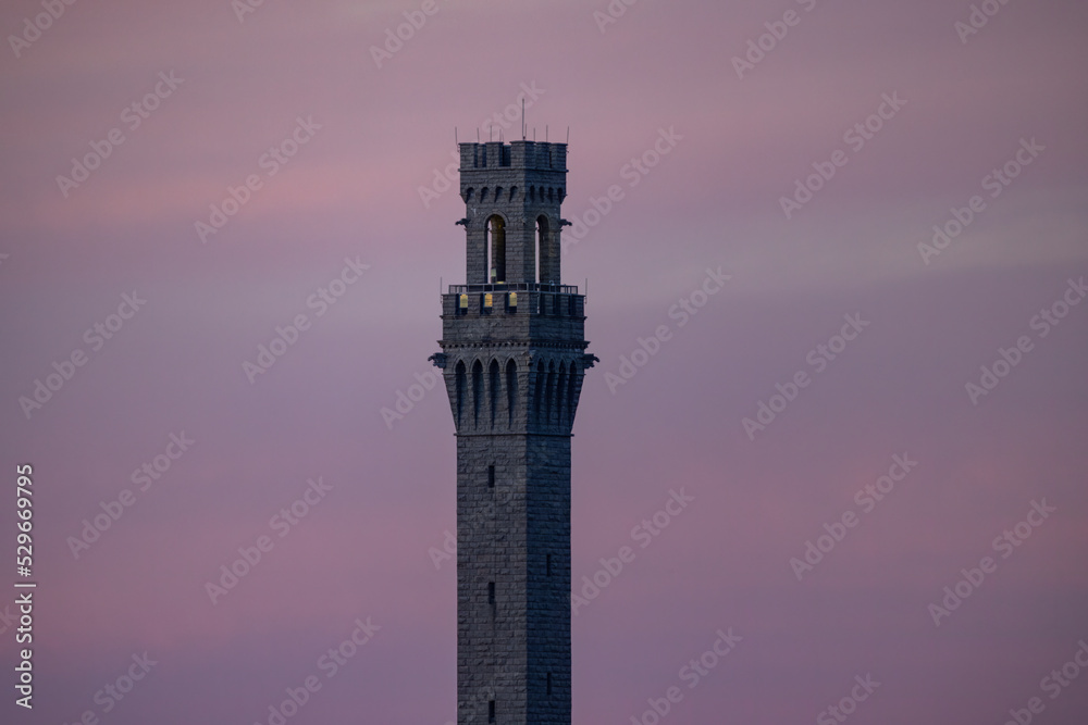 Pilgrim Monument At Provincetown Cape Cod With Shades Of Purple, Pink, And Magenta In The Background