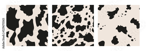 Set of cow seamless patterns. Animal skin vector background. Abstract spotted texture