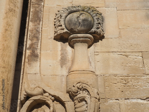 bonita escultura de piedra de una luna en relieve como ornamentación relacionada con la virgen en la fachada de la iglesia de la inmaculada concepción de la espluga calba, lérida, españa, europa photo