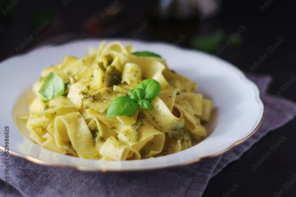 Tagliatelle pasta with pesto sauce	