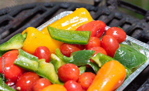 Grilled vegetables. Healthy grilling food, colorful peppers and grilled tomatoes. Colorful tasty and healthy vegetables.