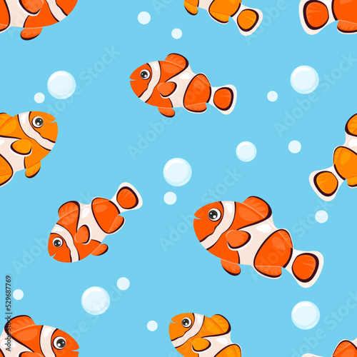 Cartoon clownfish seamless pattern. Background with cute funny sea fish. Vector cartoon flat illustration. Coral reef dweller.