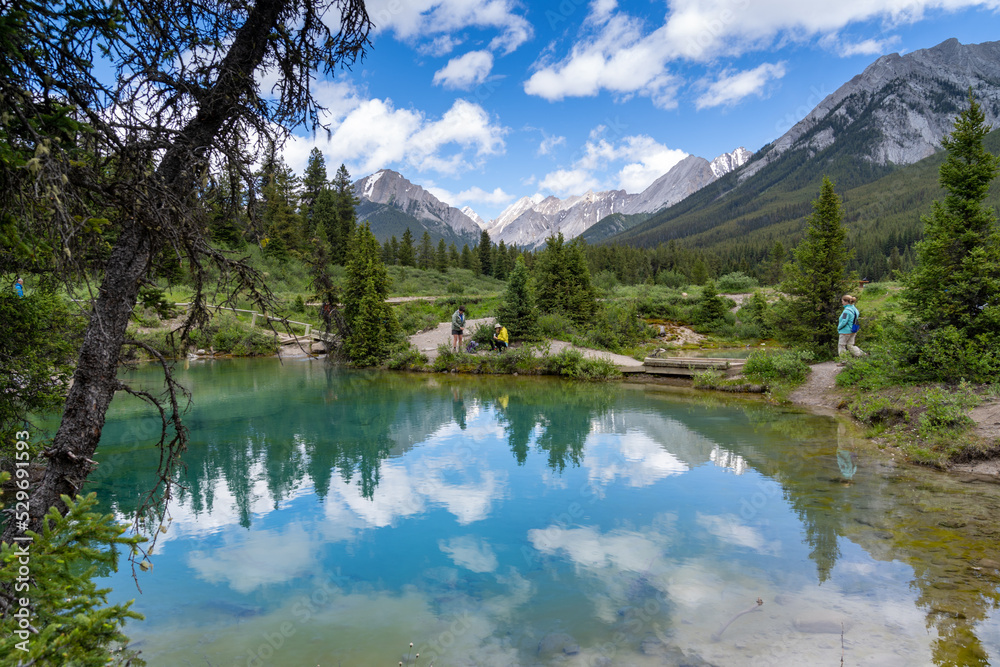 Ink Pots in Banff National Park during summer - tourists enjoy the view