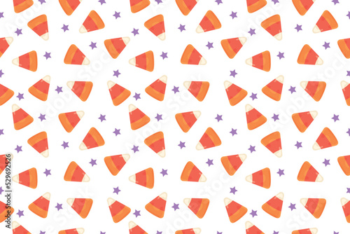 Many Halloween corn candies on white background. Pattern for design