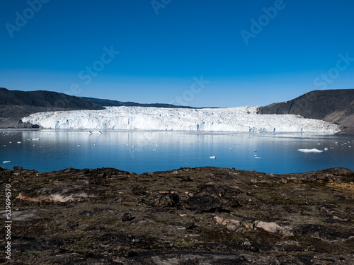 Fototapeta Naklejka Na Ścianę i Meble -  The stunning Eqi Glacier (Eqip Sermia), a rapidly retreating outlet glacier, north of the disko Bay in Western Greenland