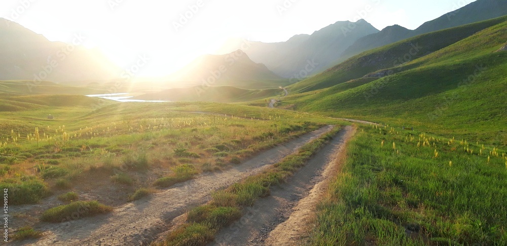 Fototapeta premium meadow and hills next to the water dam _Iran