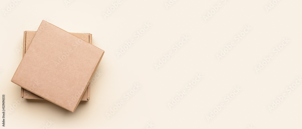 Blank cardboard boxes on light background with space for text, top view Blank cardboard boxes on light background with space for text, top view
