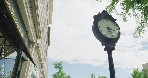 Clock tower and shops on main street in Greenwich Connecticut in summer photo