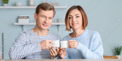 Happy couple drinking coffe...