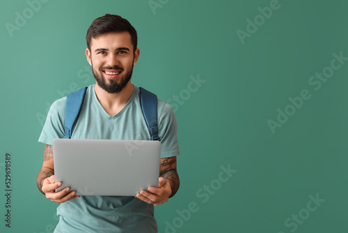 Handsome tattooed student w...