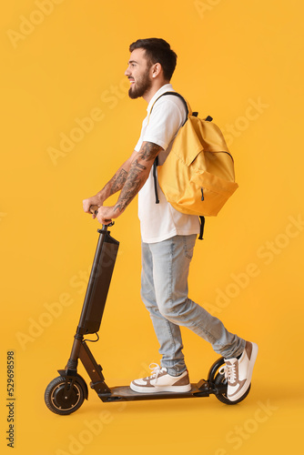 Handsome tattooed student w...