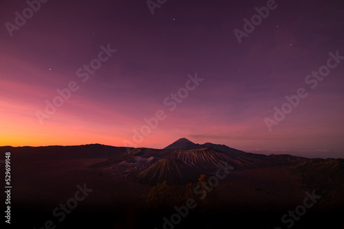 Million Stars with wonderful sky at sunrise over Mount. Bromo at Bromo Tengger Semeru National Park, East Java, Indonesia.Milky way and stars above Mount Bromo volcano at night..Sunrise at Mt. Bromo.