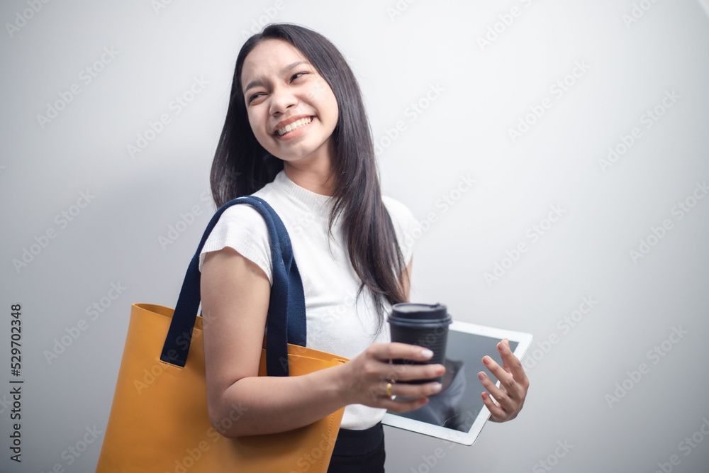 happy asian woman online shopping Check the daily store sales data on the smartphone and the sales seem particularly good. which made the owner very happy
happy asian woman online shopping Check the daily store sales data on the smartphone and the sales seem particularly good. which made the owner very happy
