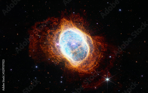 Fototapeta Naklejka Na Ścianę i Meble -  Southern Ring Nebula. Space collage from newest cosmic telescope. James webb telescope research of galaxies. Landscapes of Deep space. JWST. Elements of this image furnished by NASA
