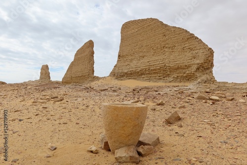 The walls and ruins of Dimeh el Sibaa (Soknopaiou Nesos) in Fayoum city desert in Egypt photo