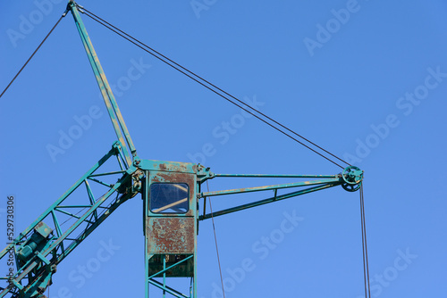 Small rusty load crane from the 50s photo