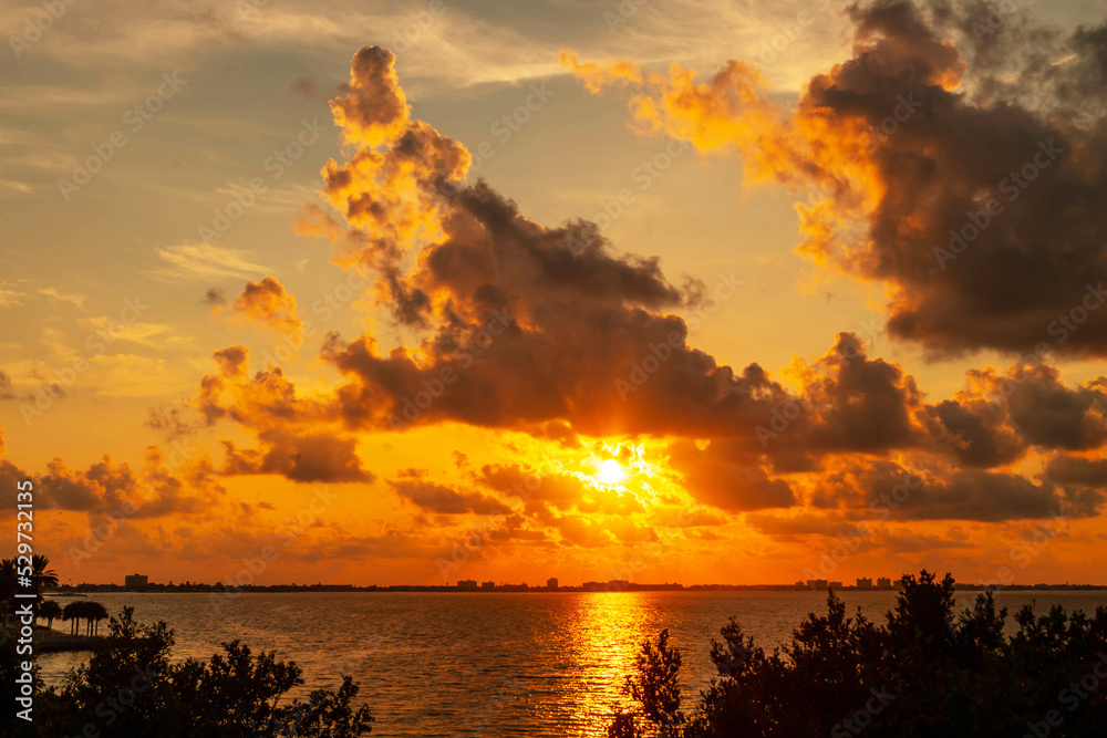 Sunset at sea golden sky and clouds beautiful landscape