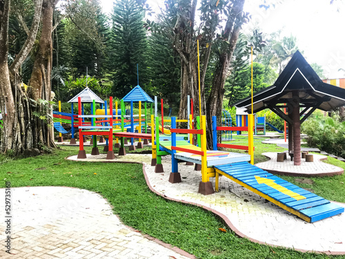 Colorful playground on yard in the park.