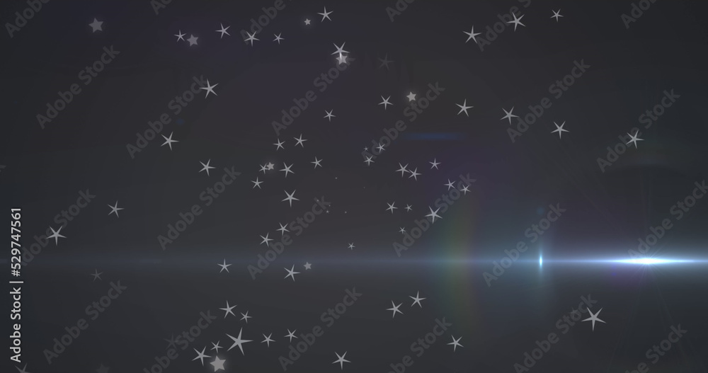 Fototapeta premium Image of glowing blue light moving over stars in background