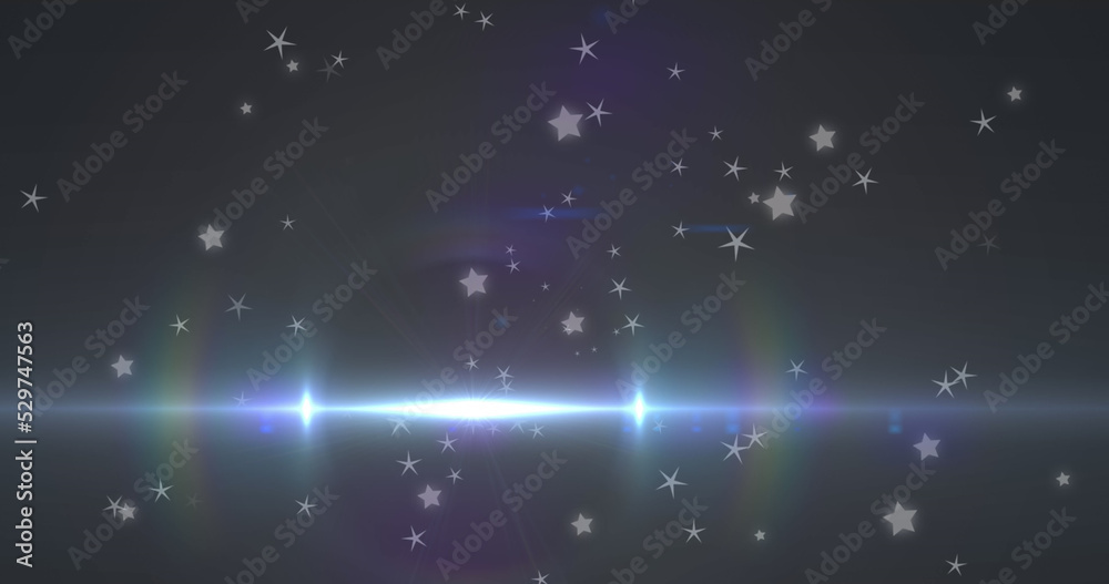 Fototapeta premium Image of glowing blue light moving over stars in background