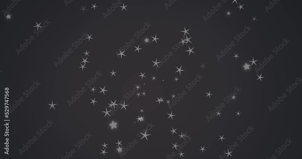 Naklejka premium Image of glowing blue light moving over stars in background