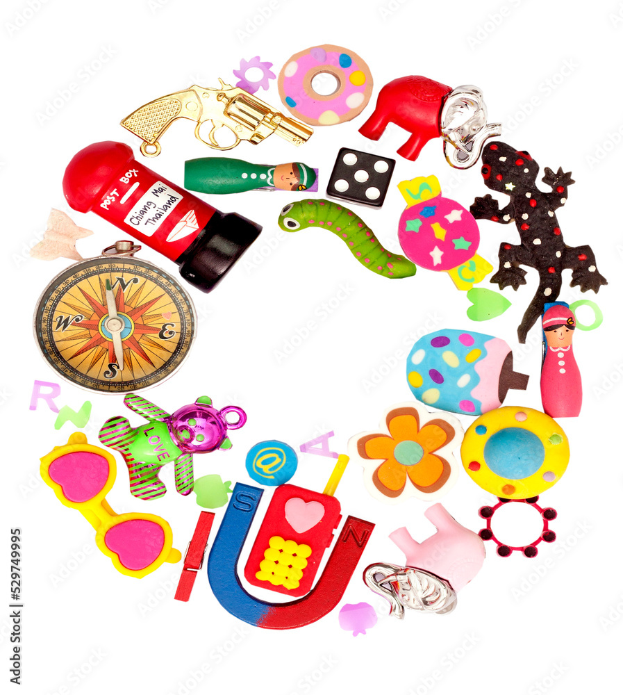 Fototapeta premium lots of random toys make up the letter O 