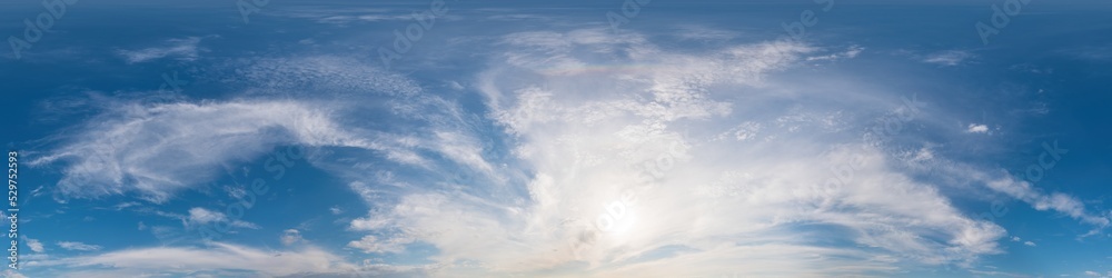Obraz premium Blue sky panorama with Cirrus clouds. Seamless hdr 360 degree pano in spherical equirectangular format. Sky dome or zenith for 3D visualization, game and sky replacement for aerial drone 360 panoramas