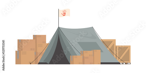 Large dark green tent with boxes. Camp element for humanitarian aid.    .