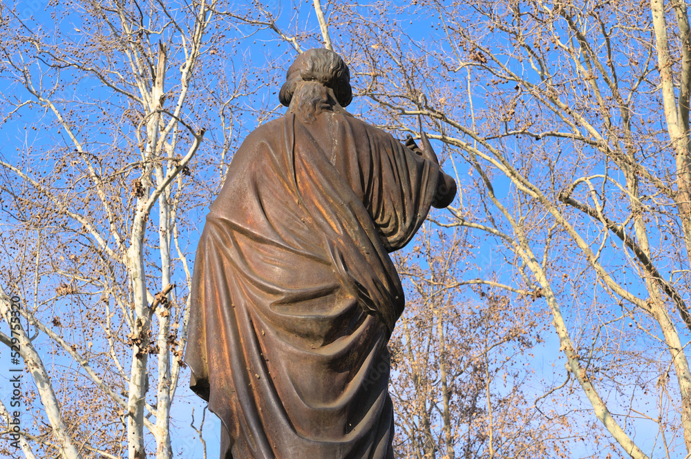 Rear view of a Bronze statue on the Alameda downtown Talca, Chile.
