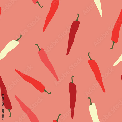 A simple pattern of peppers. cute little hot peppers. pink background. Fashionable print for textiles and wallpaper.