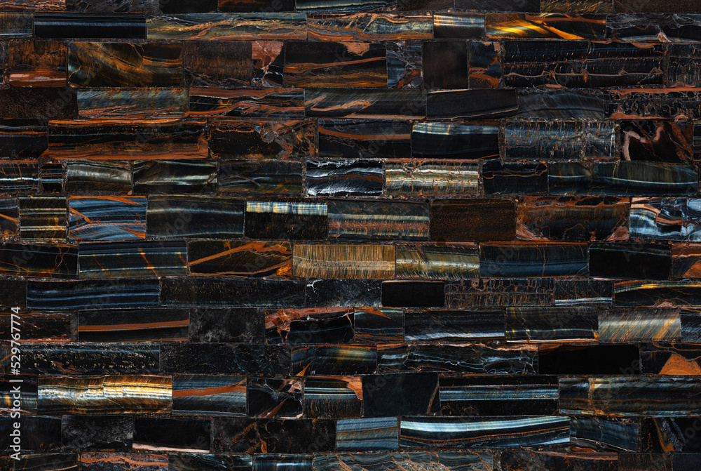 Naklejka premium Tiger Eye Blue slab. Polished semiprecious stone for ceramic wall and floor digital tiles. Exclusive luxury gemstone background. Material for unique interior, exterior design decoration.