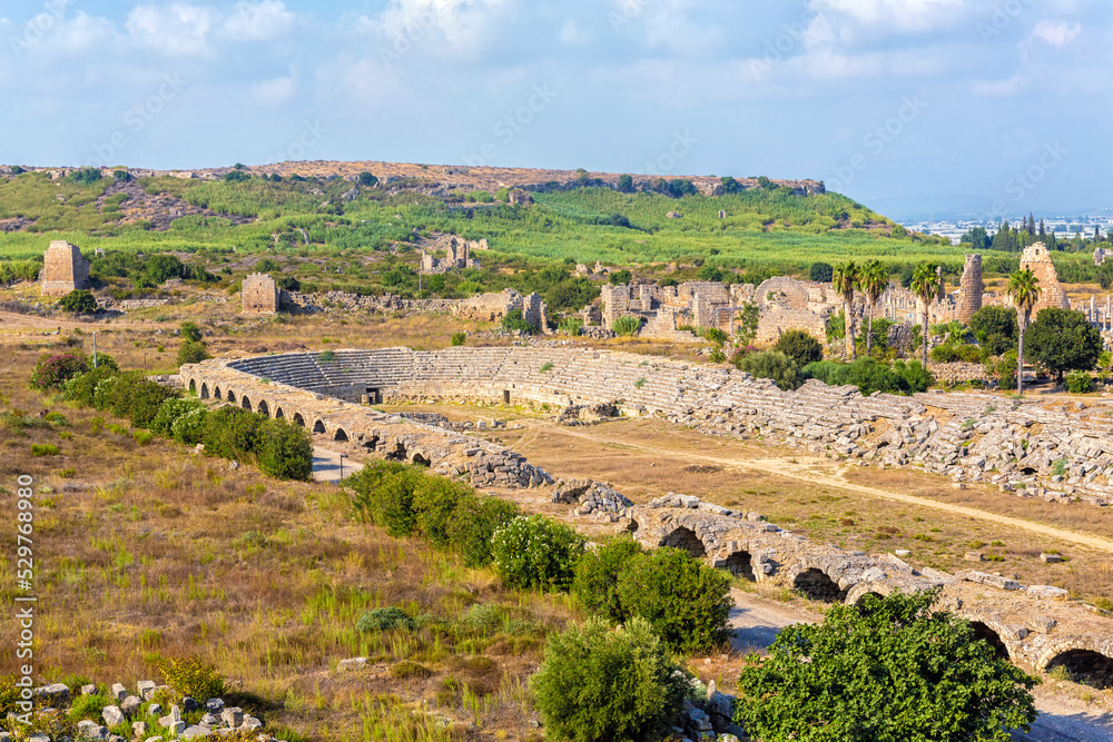 Ancient stadium in Perge. Panoramic view. Ruins of the city Perge (Perga), Greek colony and ancient Anatolian city in Pamphylia. Antalya region, Turkey (Turkiye)