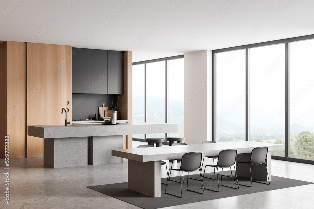Light kitchen interior with table and seats, eating zone and panoramic window Light kitchen interior with table and seats, eating zone and panoramic window
