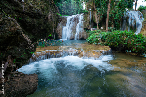 Serenity waterfall in tropical rain foerst mountain nature landscape