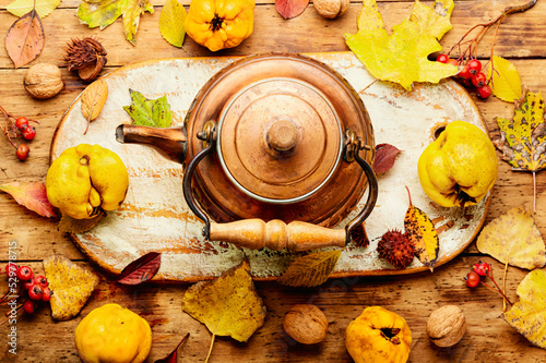 Quince tea and autumn leaves