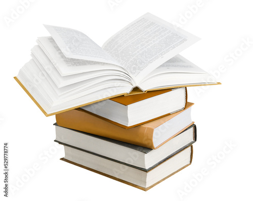 Stack of books and an opened book atop isolated on white