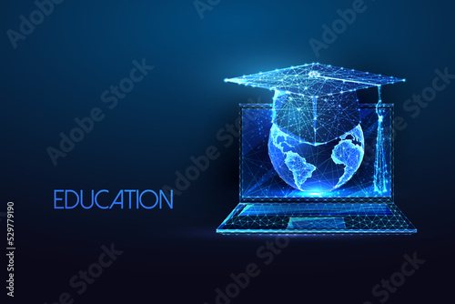 Concept of global online education with laptop, planet Earth and graduation cap in futuristic style 