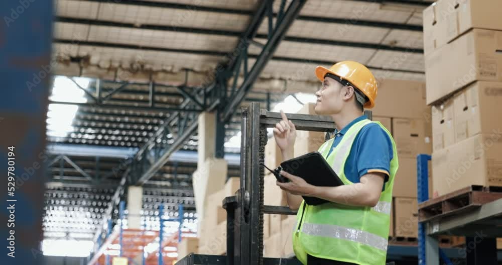 Man, manager or supervisor with hard hat, vest to hold check list sheet ...